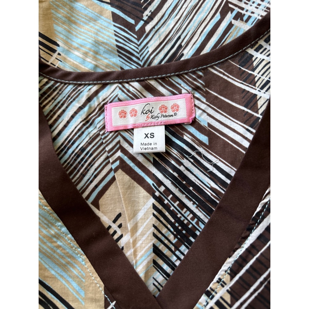 Koi NWT xs brown blue scrub top - Picture 3 of 3
